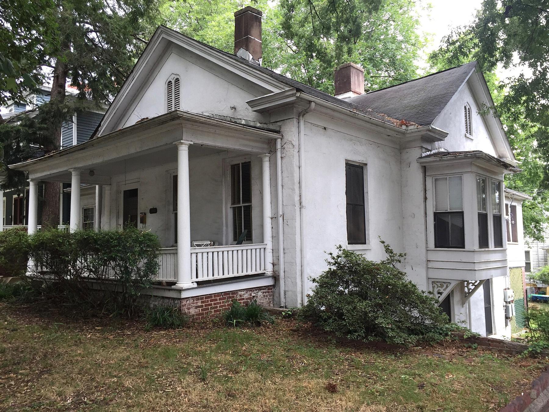White farmhouse with porch